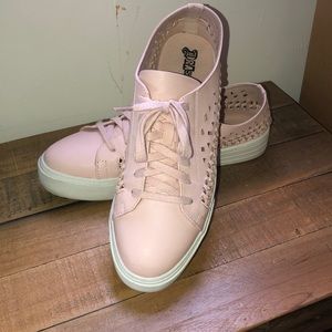 Light pink sneaker with cut out pattern